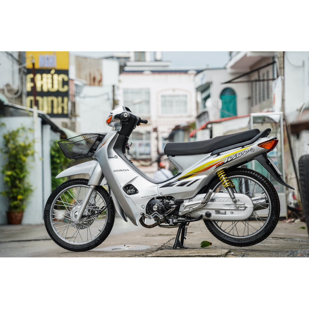 Tem wave date 2003 cho xe wave nhỏ màu bạc ( in keo trong ghép chữ wave trắng, máy Nhật )
