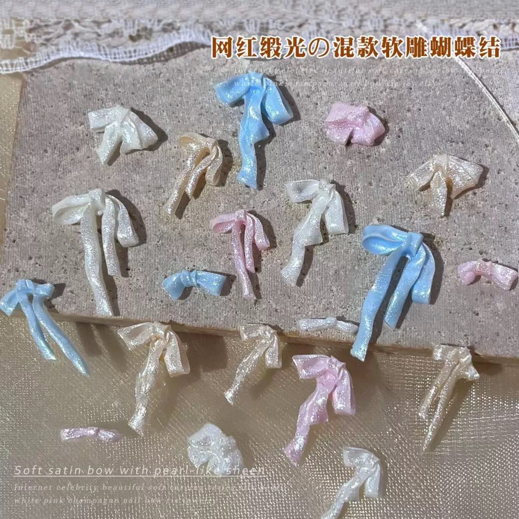 Set 50pcs charm nơ nhũ kim tuyến màu pastel mẫu mới 2026