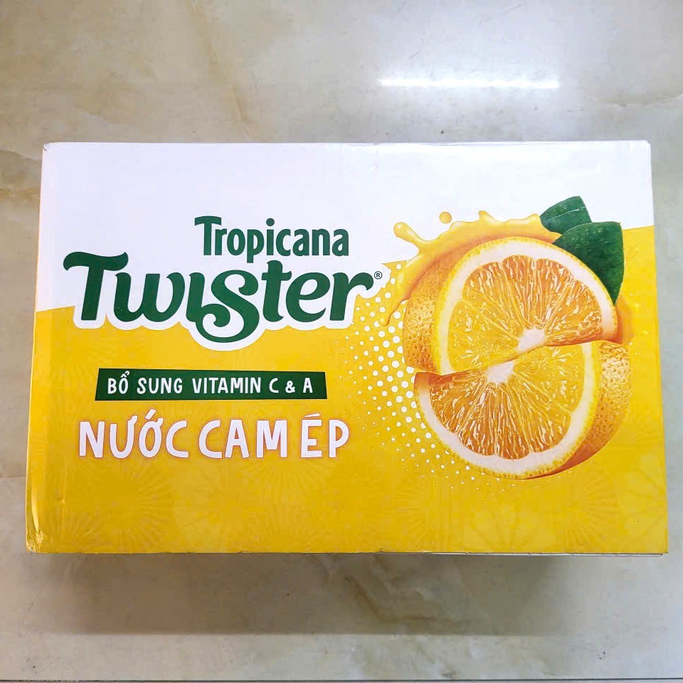 TWISTER (Thùng 24 lon x 320ml) NƯỚC CAM ÉP Twister Tropicana (HT4H)