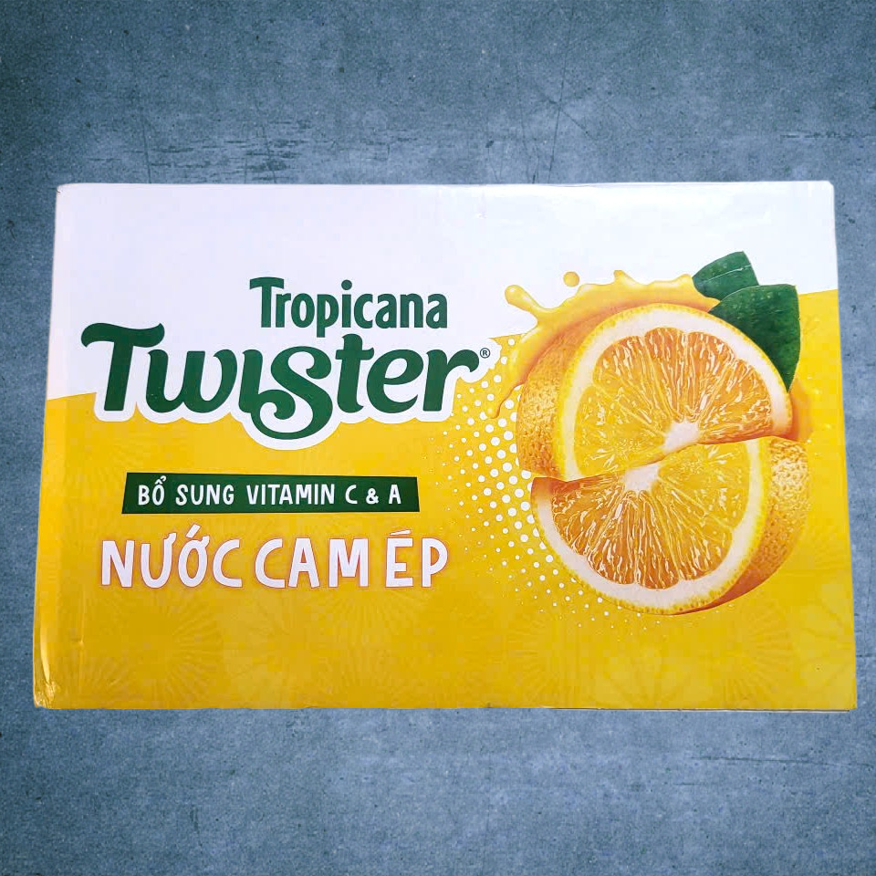 TWISTER << Thùng 24 lon x 320ml >> NƯỚC CAM ÉP Twister Tropicana (HT4H)