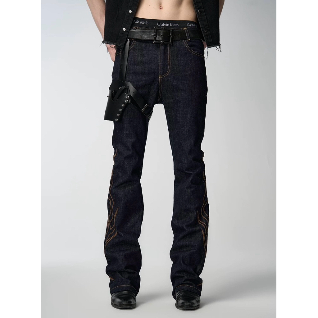 Embroidered jeans, raw denim, flared legs