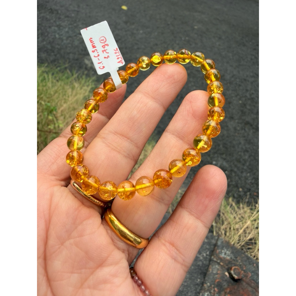 (A2126) Vòng hổ phách hoa vàng 6mm+