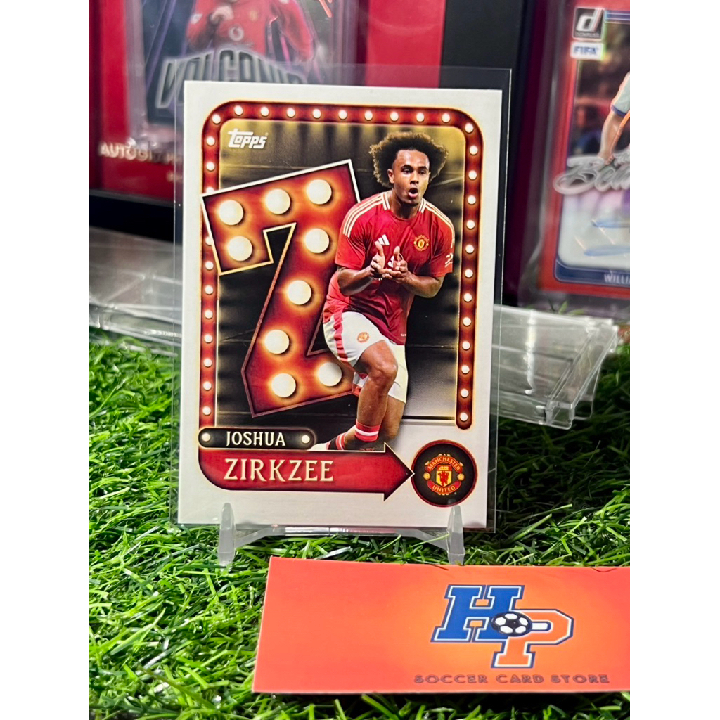 Thẻ bóng đá Joshua Zirkzee Name In Light Topps Manchester United Collecter Tin 2025/26