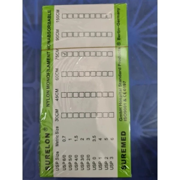 Chỉ nilon 6/0 hộp 12 sợi( chỉ liền kim khâu)