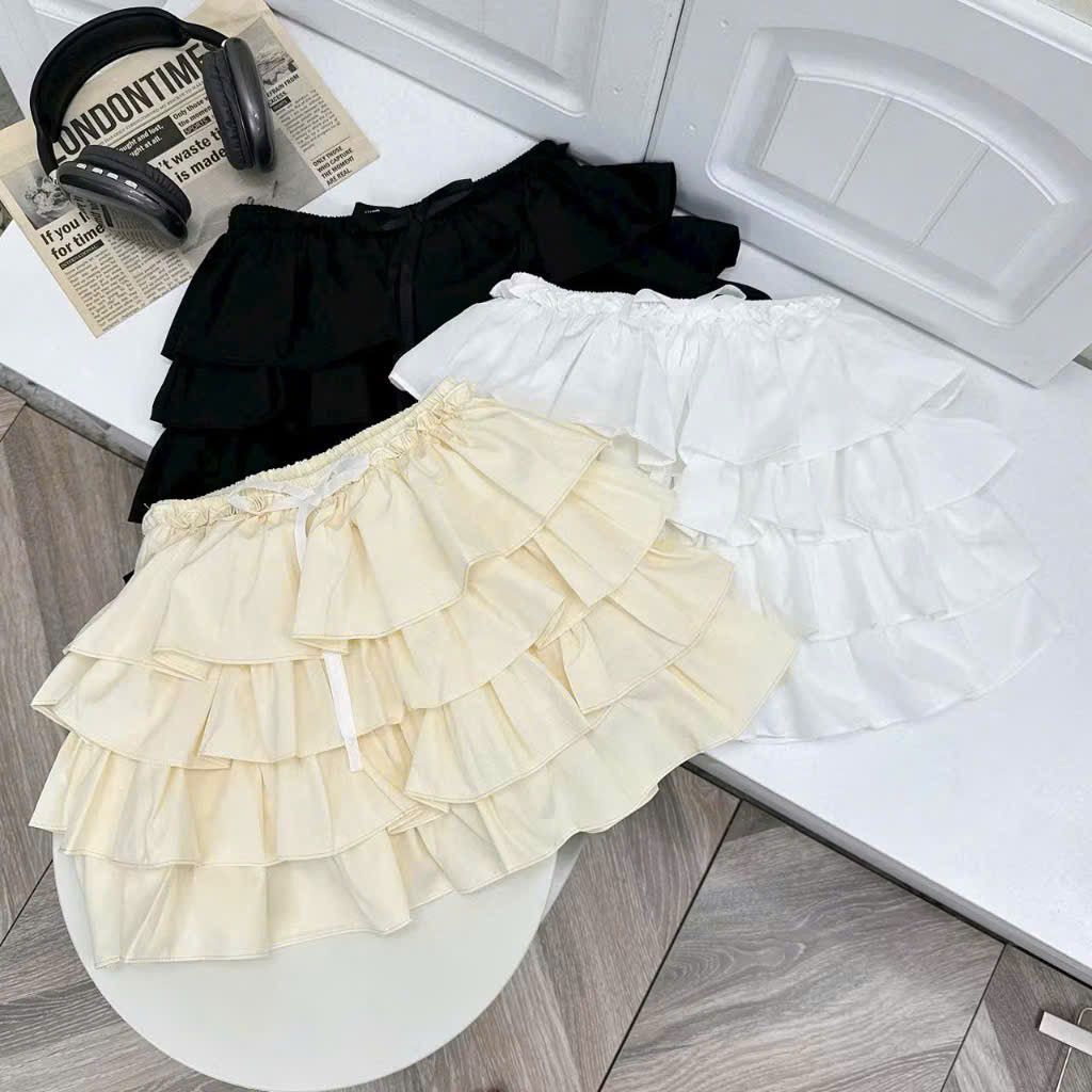 CHÂN VÁY 4 TẦNG LƯNG CHUN ĐÍNH NƠ Có Lót Quần 
