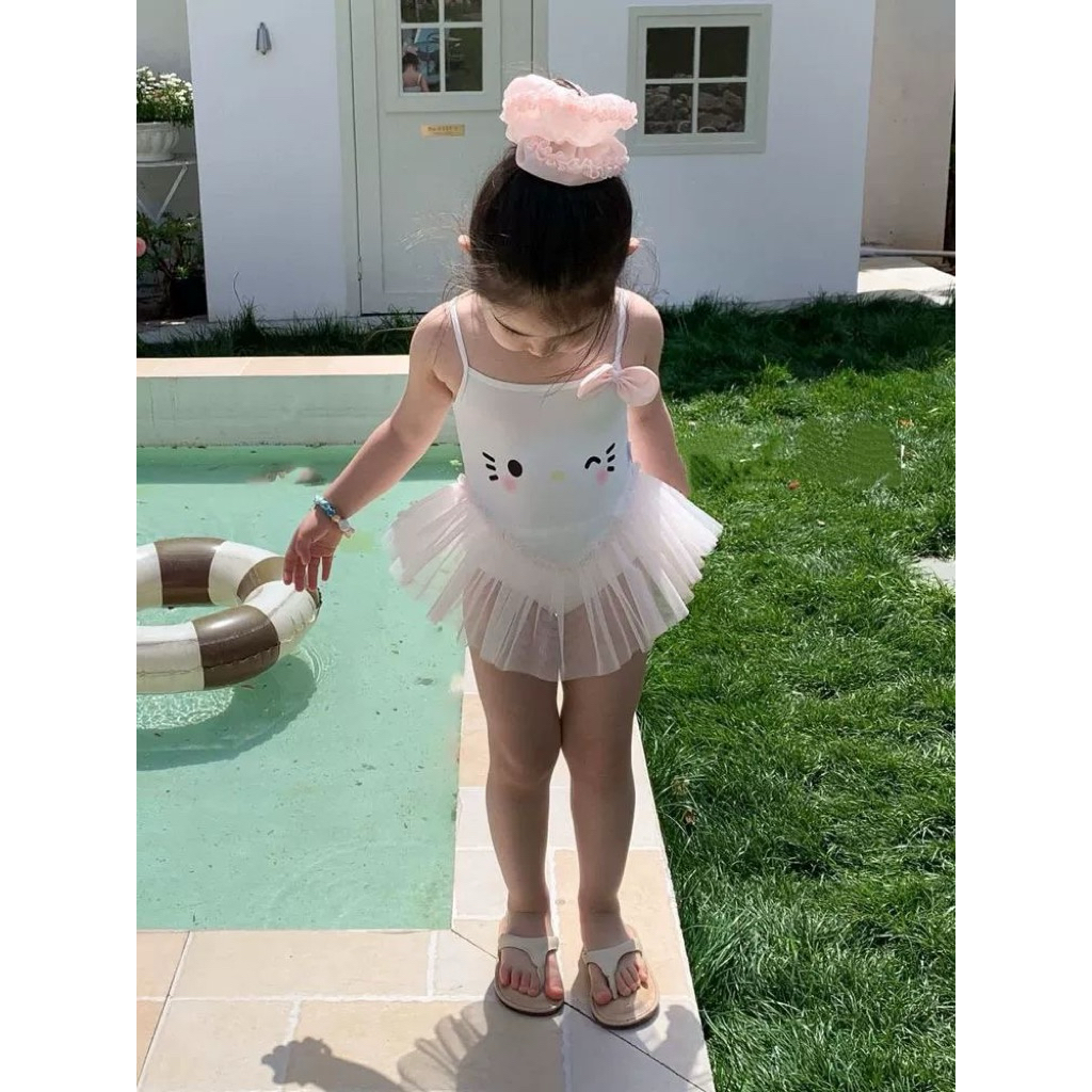 Bikini thỏ hai dây tua rua váy cho bé