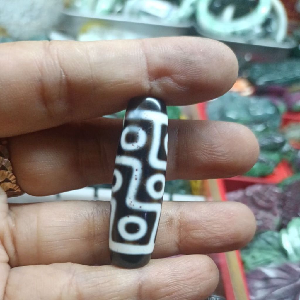 dzi 9 mắt chúna den