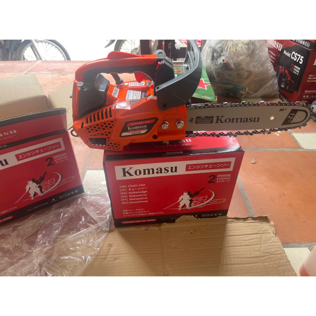 Máy cưa xích Komasu KM - 2500 Máy Cưa Xích Chạy Xăng Komasu KM 2500 Cưa Mini, bảo hành 12 tháng