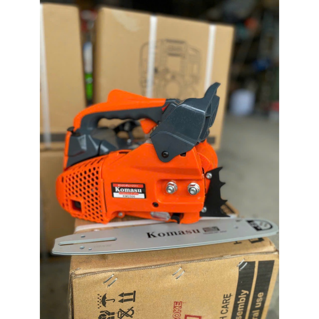 Máy cưa xích Komasu KM - 2500 Máy Cưa Xích Chạy Xăng Komasu KM 2500 Cưa Mini