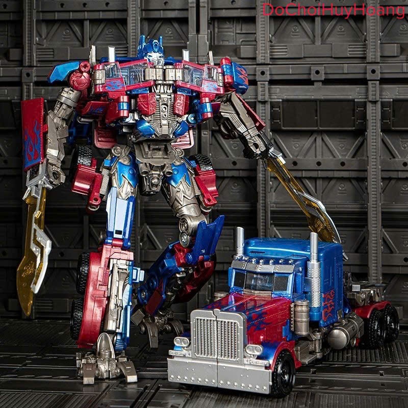 Mô hình robot Optimus biến đổi thành xe oto cao 17cm 8801