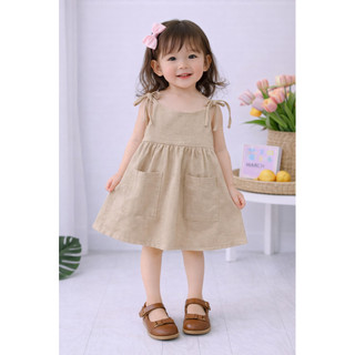 Váy đũi 2 dây thắt nơ bé gái
