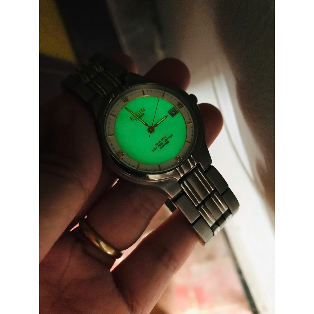 Đồng hồ nam si Nhật ELGIN USA mặt 35mm pin solar có dạ quang mặt khảm xà cừ