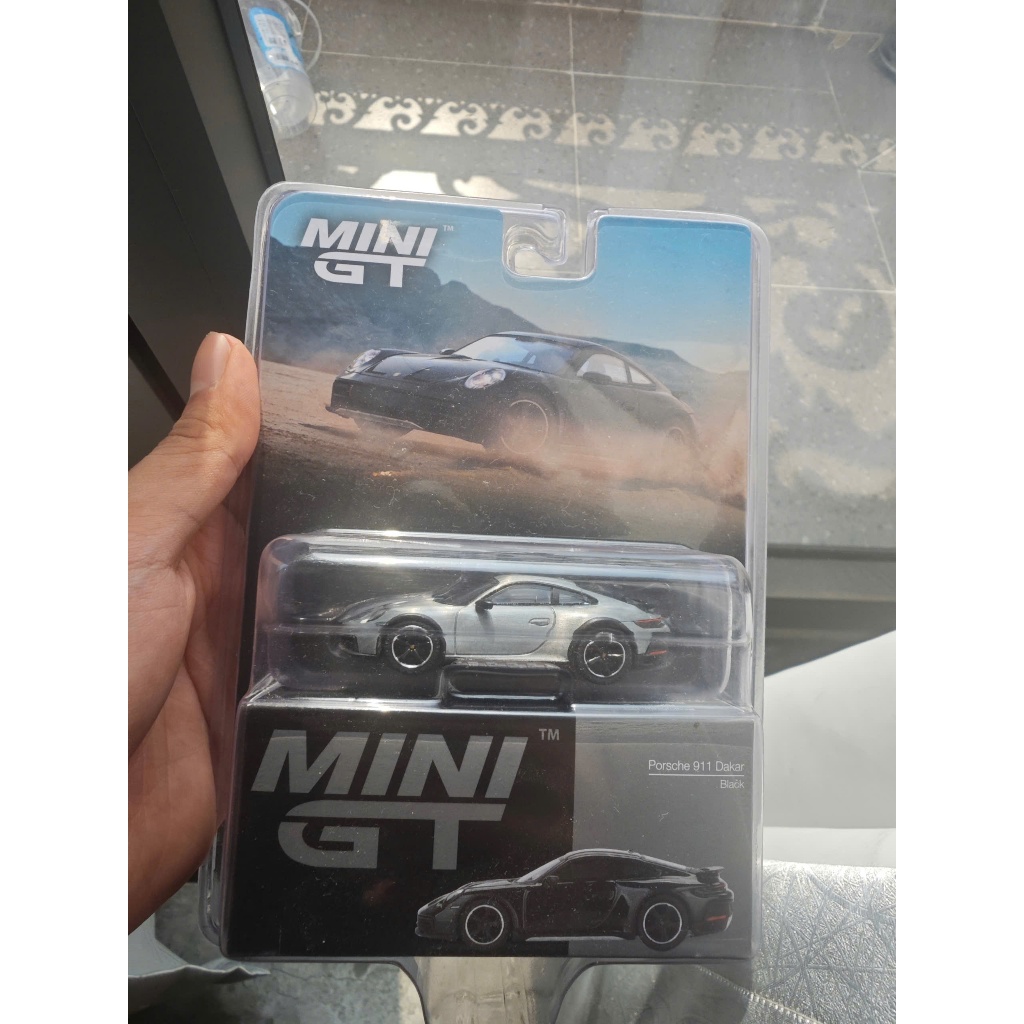 Xe mô hình MINI GT Porsche 911 Dakar Black Chase 1:64 chính hãng (bản chase)