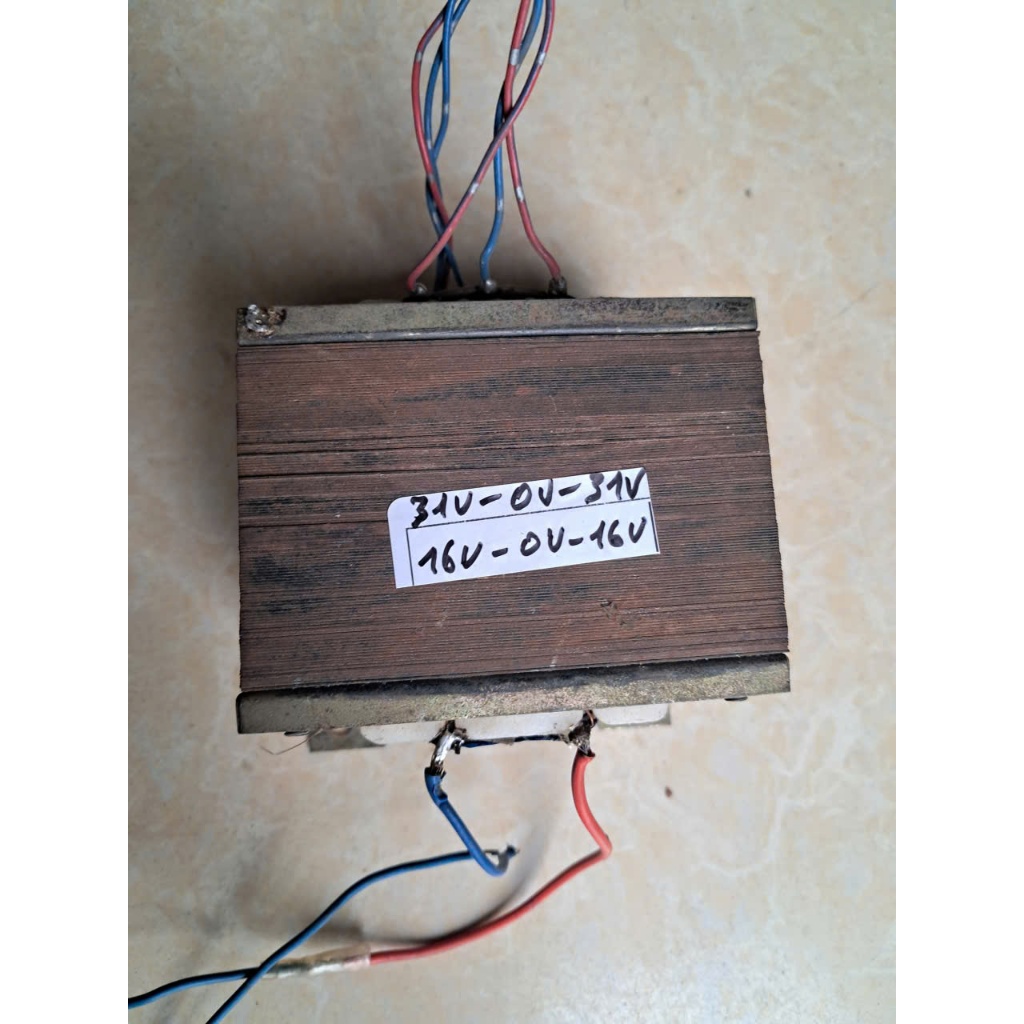 biến áp âm ly (nguồn đôi) tháo ở âm ly cũ đã qua sử dụng- vào AC 220v, ra AC 31v - 0v - 31v, + AC16v
