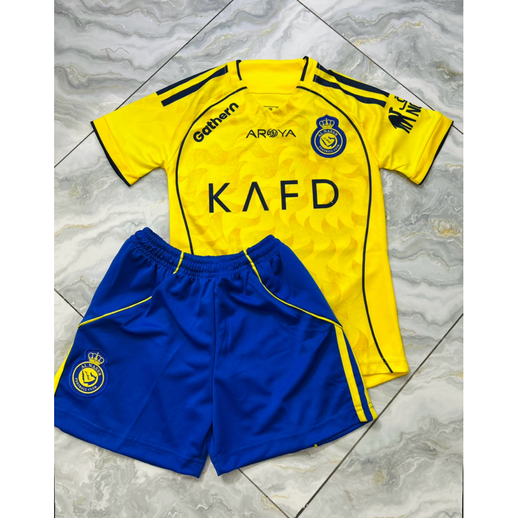 Bộ quần áo TRẺ EM Clb Al-Nassr FC 2026 - Vải vẩy rồng siêu cấp
