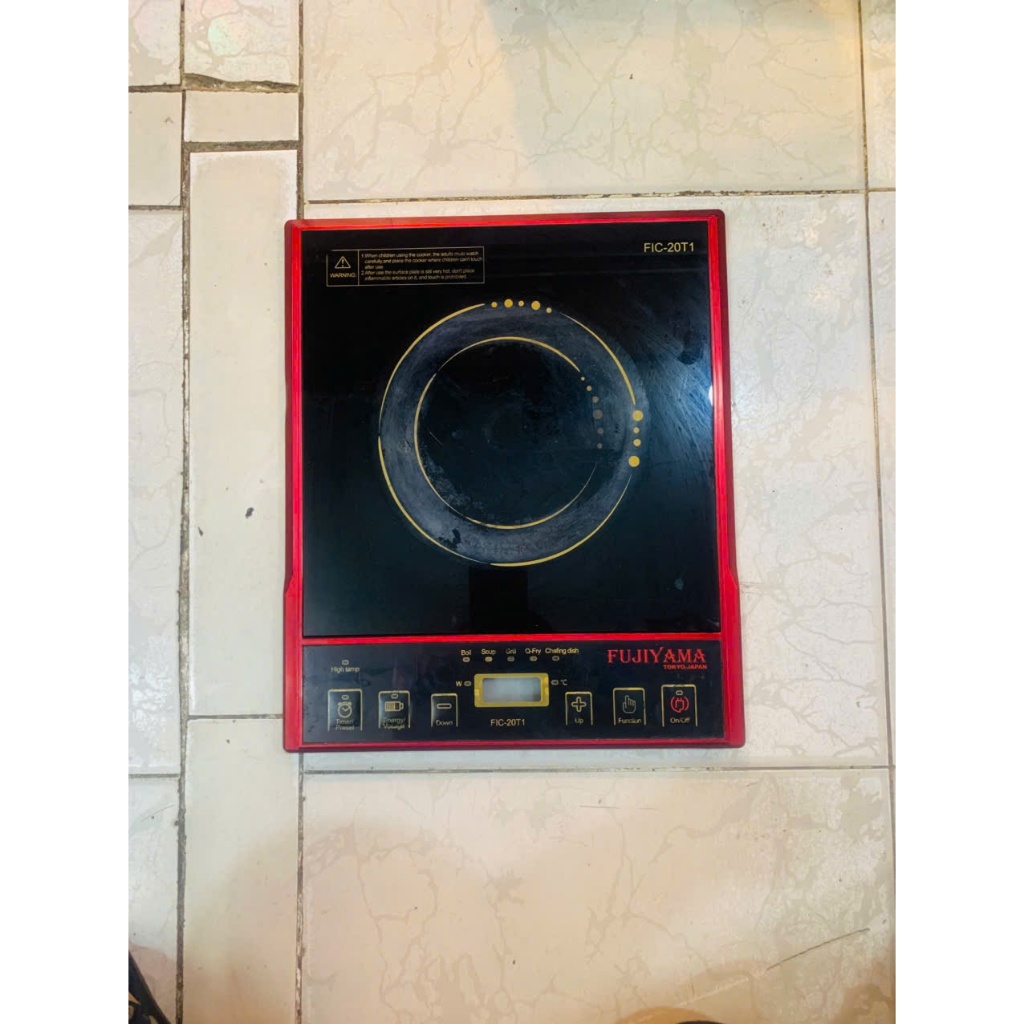 Mặt kính bếp FuJiYama FIC-20T1 ( hàng tháo bếp đã qua sử dụng)