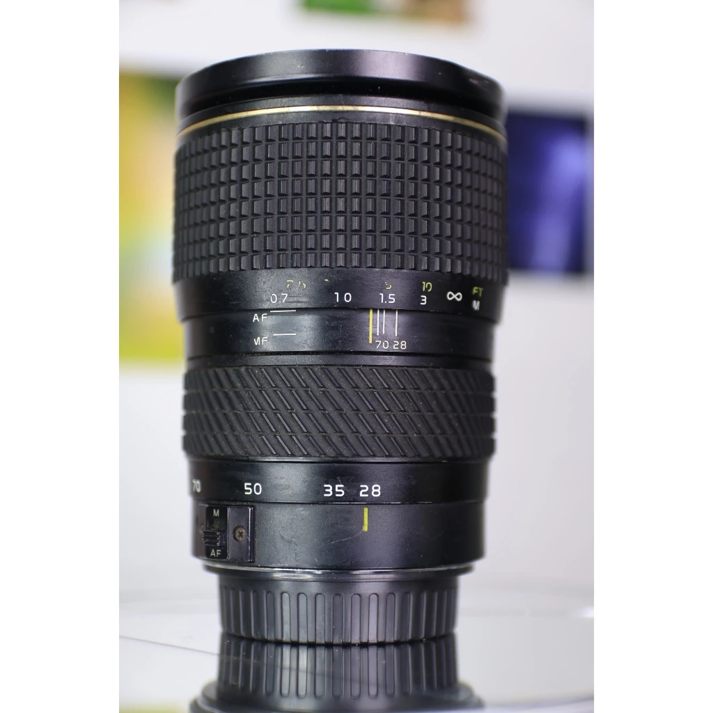 Lens canon Tokina 28-70mm f2.8 AX-T (95%) thấu kính tương đối sạch đẹp