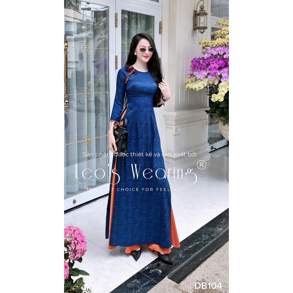 DB104 LEOSWEARING Áo dài gấm lụa cổ tròn đính hoa to, tay lửng xanh phối viền cam và Quần lụa cam