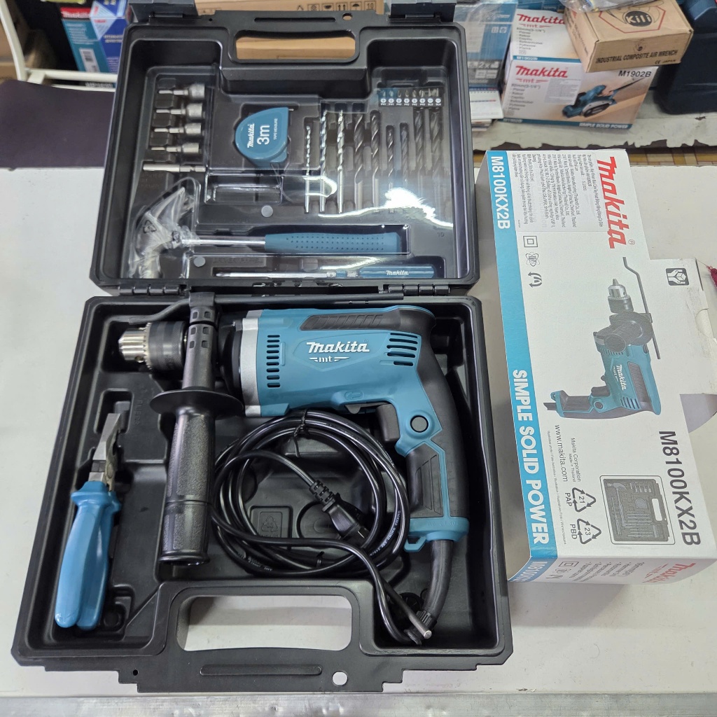 (BỘ 26 PHỤ KIỆN) MÁY KHOAN BÚA 710W/13MM MAKITA M8100KX2B (MADEIN THAILAND)