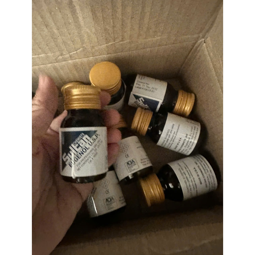 Nước eugenol trộn xi măng trám tạm