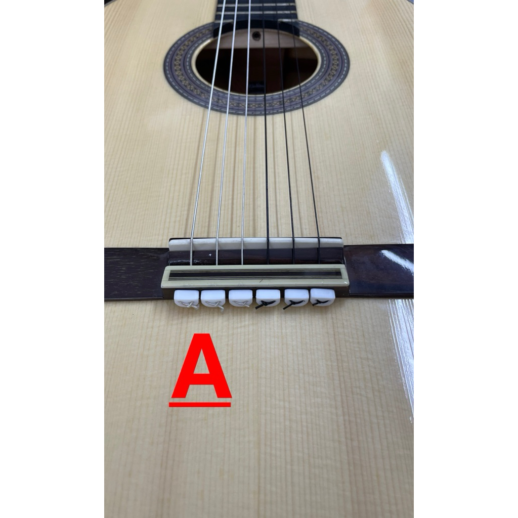 Thay dây guitar classic. Phụ kiện buộc dây cho guitar classic.