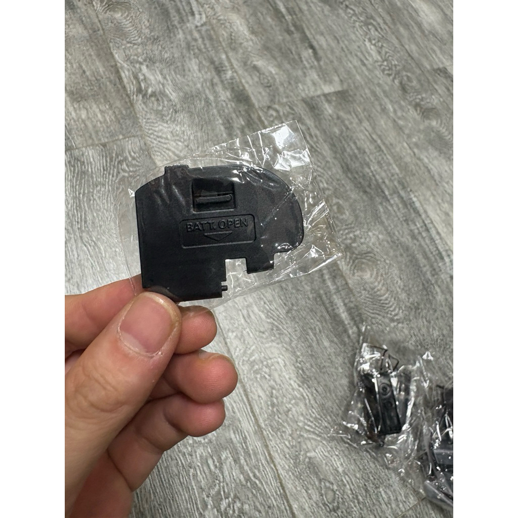 nắp che pin size zin cho canon 40d
