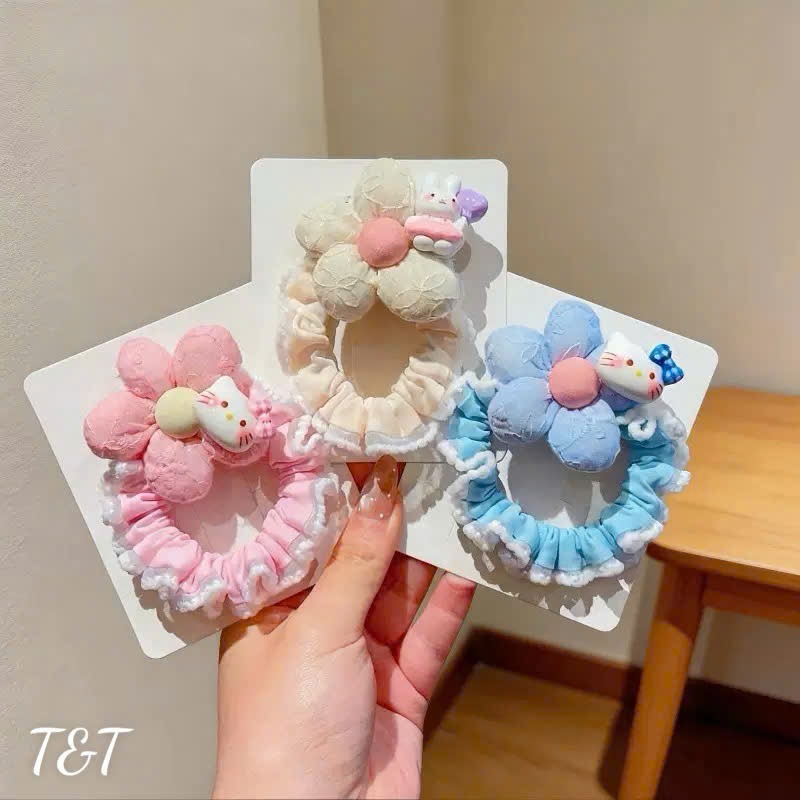 Cột tóc hoa viền ren charm kitty siêu yêu hottrend cho bé