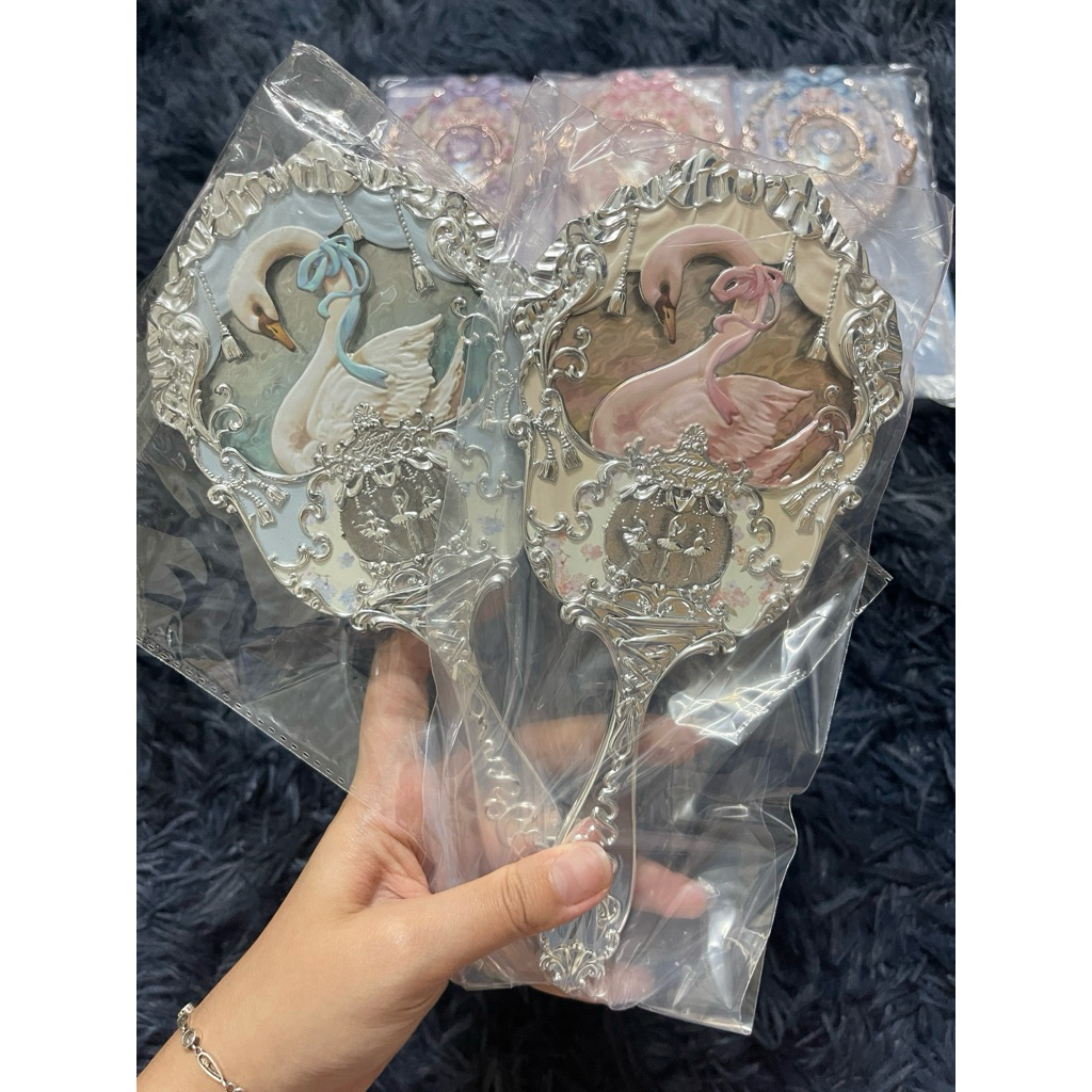 Gương swan be hoa biết