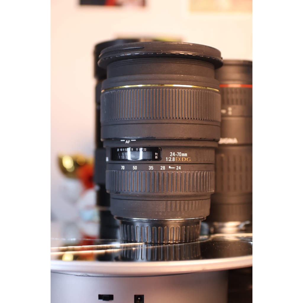 lens canon Sigma 24-70mm f2.8 EX DG hoạt độ tốt 97% - bảo hành 1 tháng