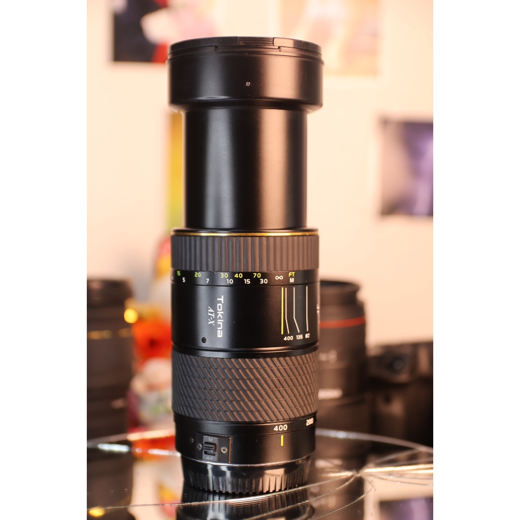 Lens Tokina AT-X 80-400mm f/4.5-5.6 for canon ef (hoạt động tốt - bên trong thấu kính có bụi)