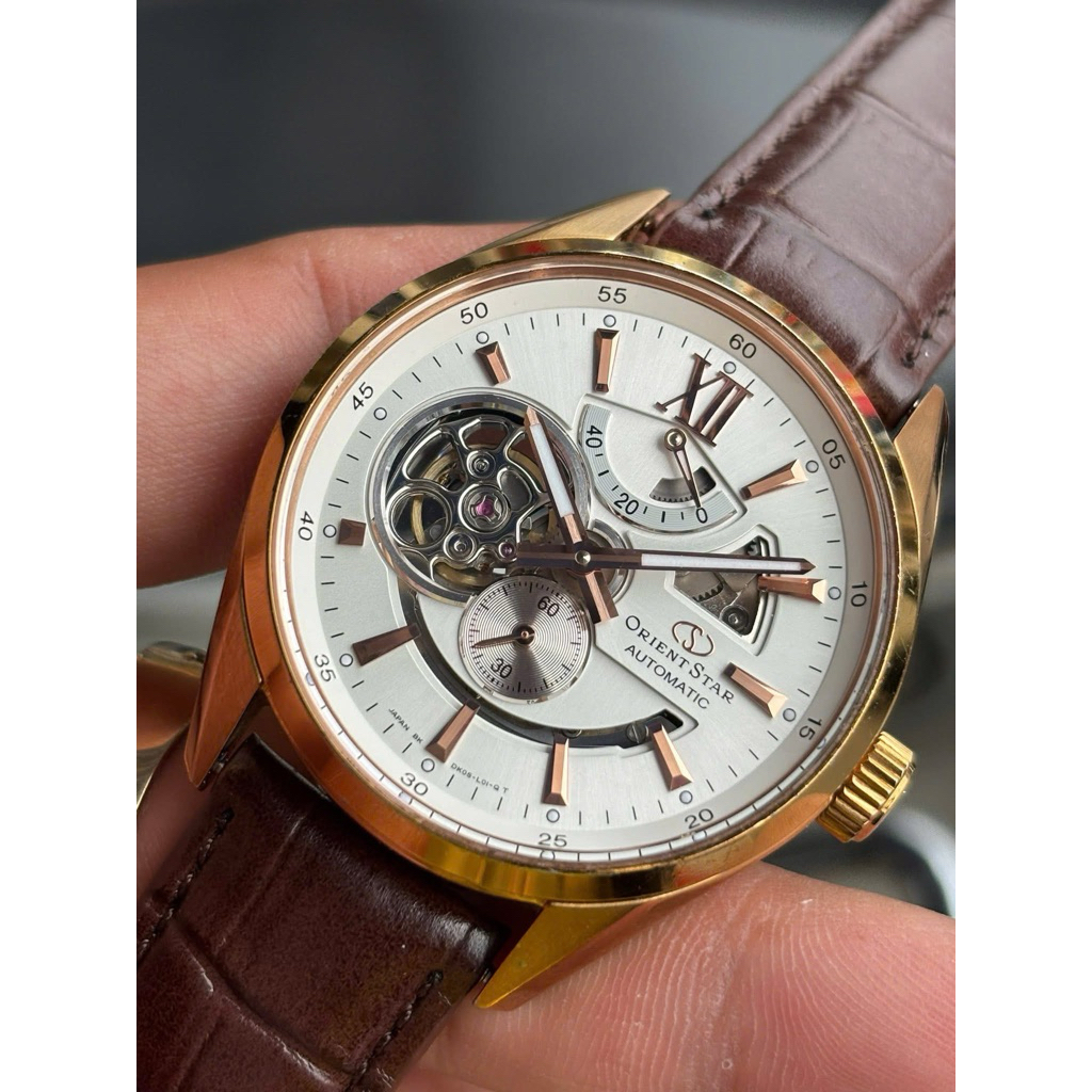 Đồng Hồ Nam Orient Star Joker SDK05003W0 Automatic Size 41 Rose Gold Semi Skeleton Like New