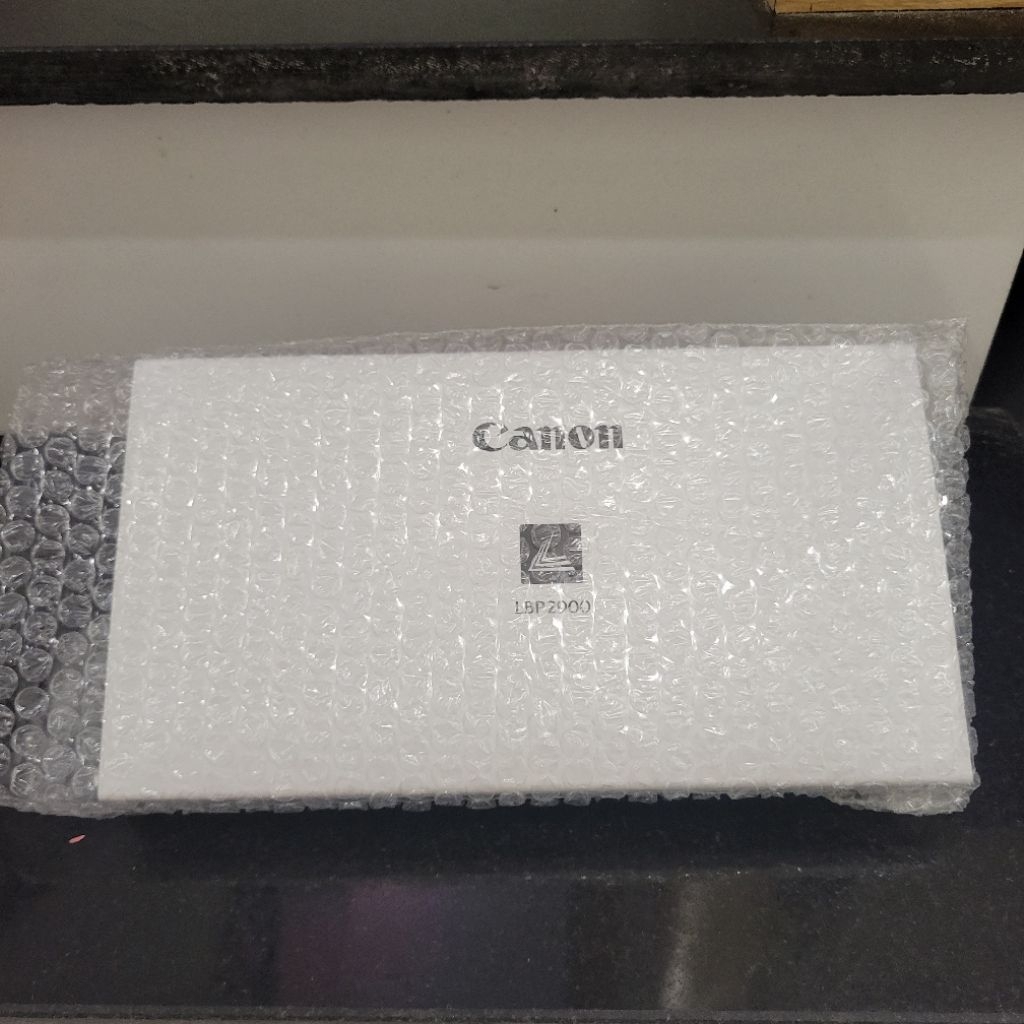 Khay để giấy vào máy in Canon 2900/3000 - Cửa máy in canon 2900