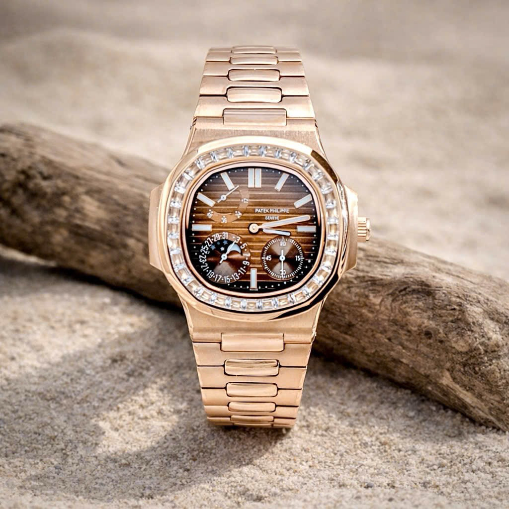 PATEK PHILIPPE 𝐍𝐚𝐮𝐭𝐢𝐥𝐮𝐬 𝟓𝟕𝟏𝟐𝐑, 𝟱𝟳𝟮𝟰𝗚-𝟬𝟬𝟭𝐁𝐚𝐠𝐮𝐞𝐭𝐭𝐞 - automatic