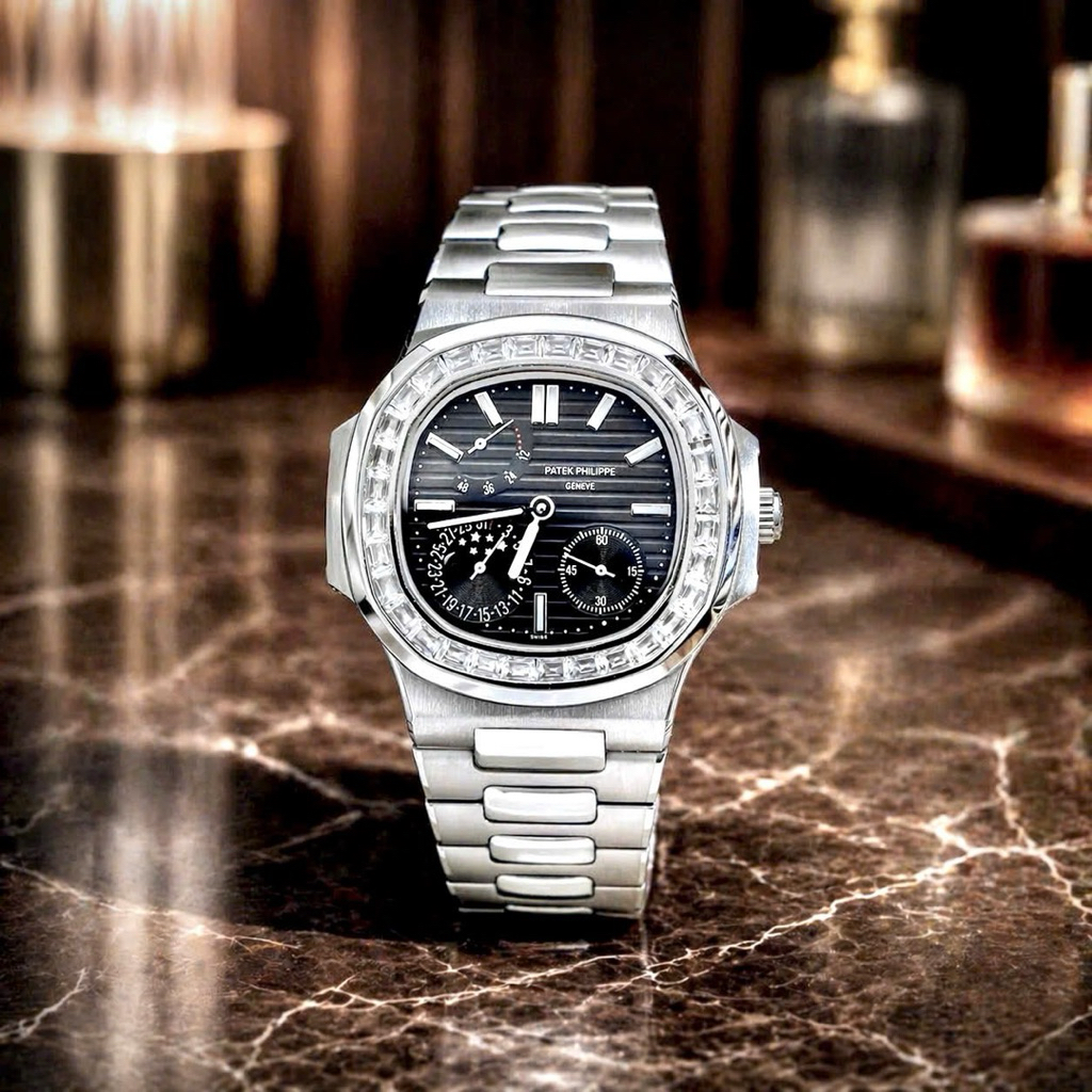 PATEK PHILIPPE 𝐍𝐚𝐮𝐭𝐢𝐥𝐮𝐬 𝟓𝟕𝟏𝟐𝐑, 𝟱𝟳𝟮𝟰𝗚-𝟬𝟬𝟭𝐁𝐚𝐠𝐮𝐞𝐭𝐭𝐞 - automatic