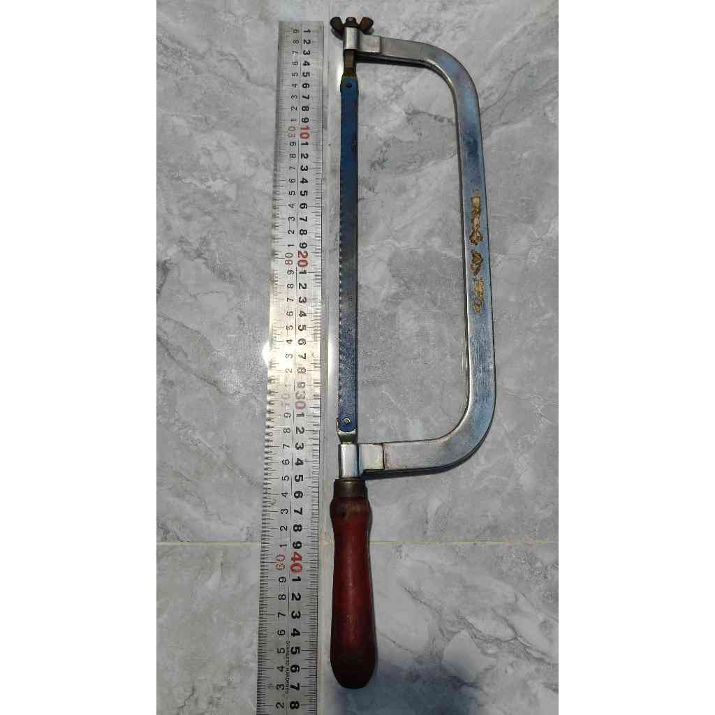 Đồ nghề bãi: Cưa sắt dài 46cm, lưỡi 26cm còn dùng tốt