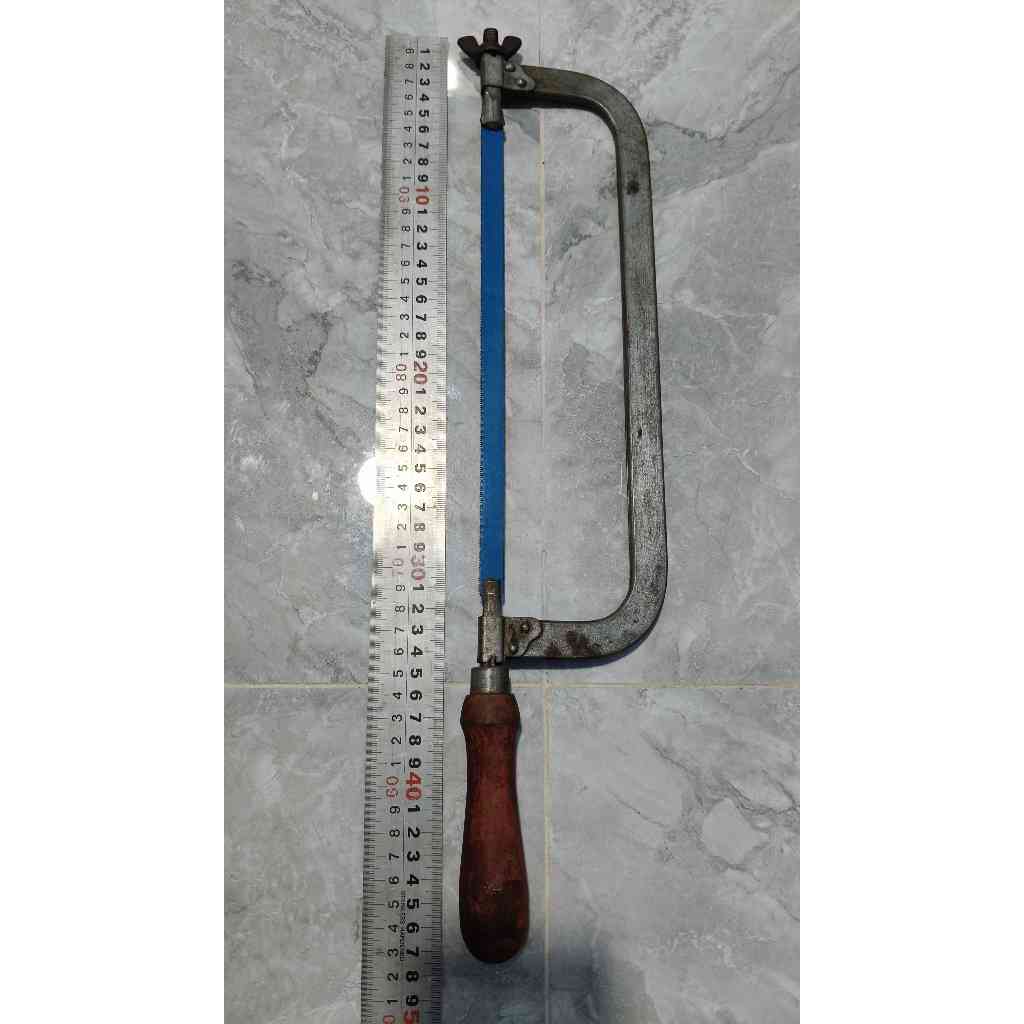 Đồ nghề bãi: Cưa sắt dài 46cm, lưỡi còn khá bén dài 26cm còn dùng tốt