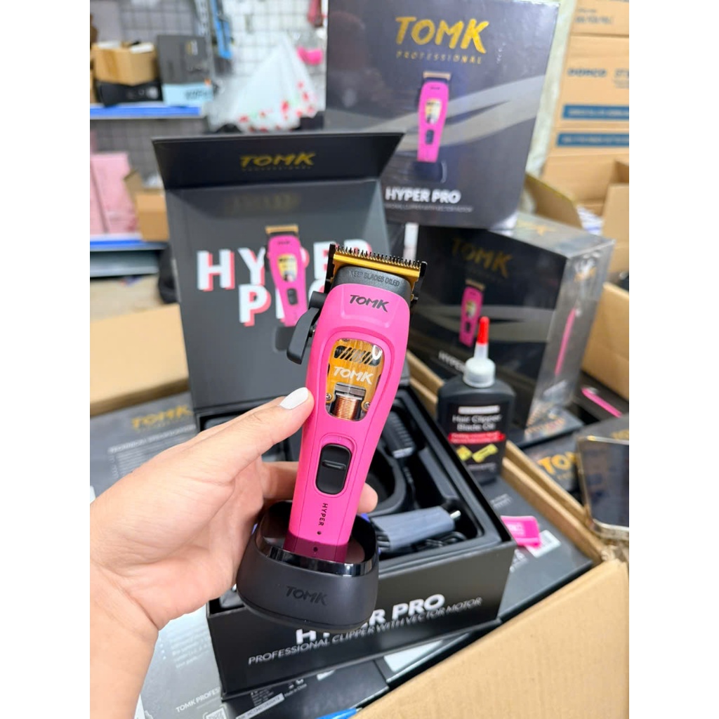 Tông đơ cắt tóc từ tính hồng TOMK Professional.