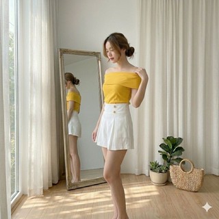 Quần short xếp ly giả váy đính nút