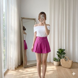 Quần short xếp ly giả váy đính nút