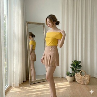 Quần short xếp ly giả váy đính nút