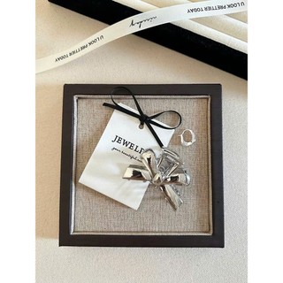 Kẹp tóc nơ bạc Coquette