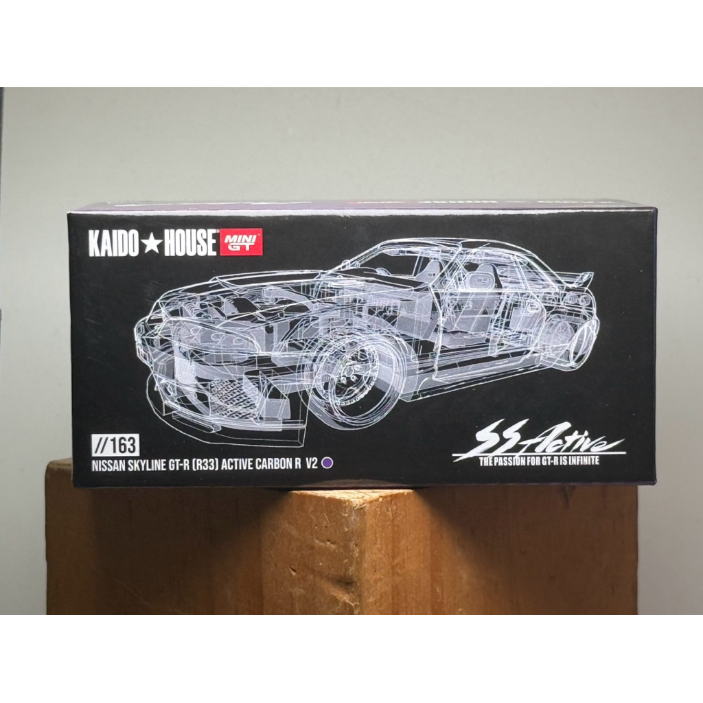 Xe mô hình tỷ lệ 1/64 mô phỏng ô tô Kaido House CHASE 163 Nissan Skyline GTR R33 Carbon (đã qua sử d