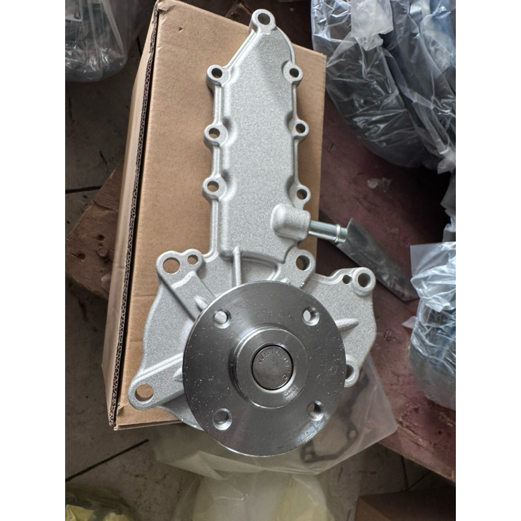 Bơm nước động cơ máy gặt lúa kubota DC60/70