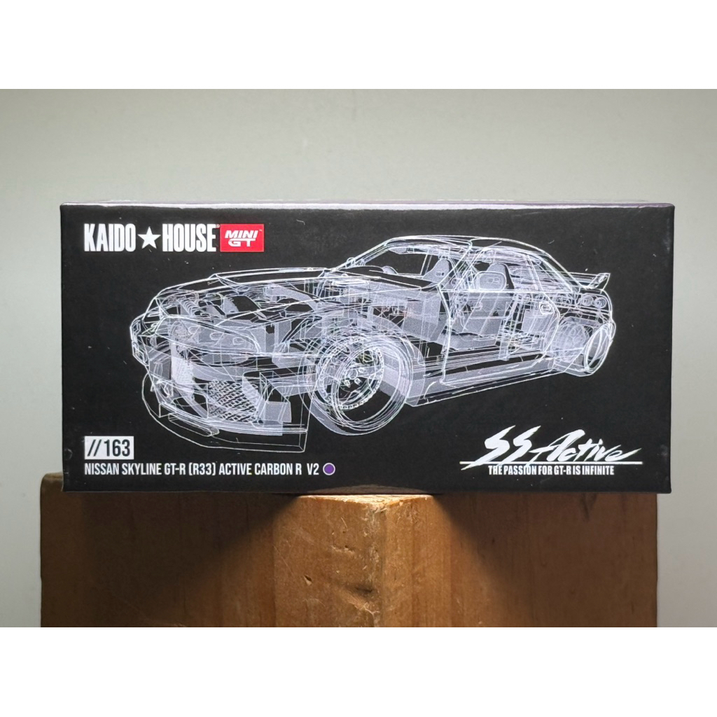 Xe mô hình tỷ lệ 1/64 mô phỏng ô tô Kaido House 163 Nissan Skyline GTR R33 Active Carbon (đã qua sử 