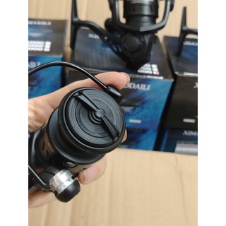 Máy câu cá Ximanuodaili 3000 cối kim loại giá học sinh