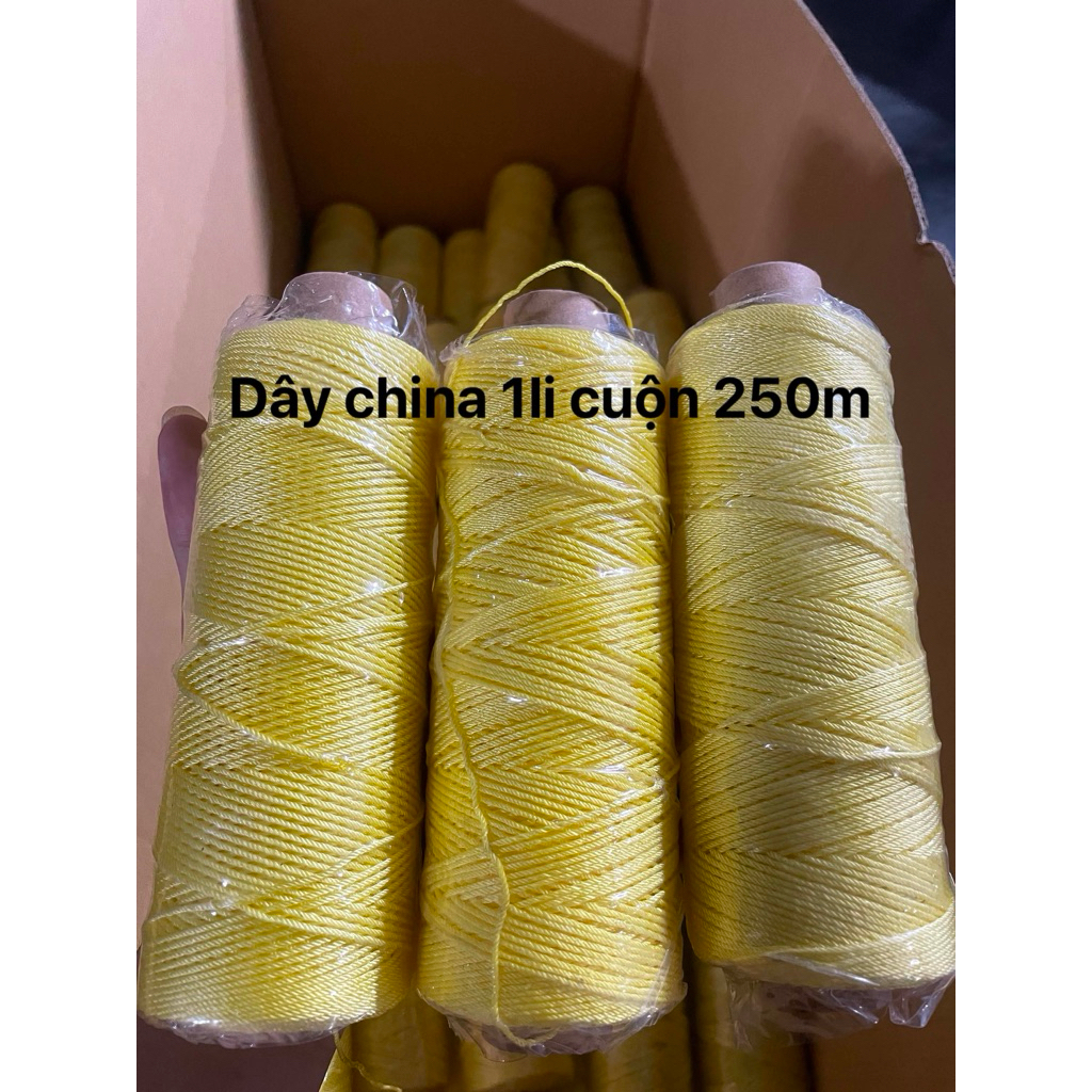 Dây dù vàng china 1li cuộn 250m dùng thả diều 1m2-1m7