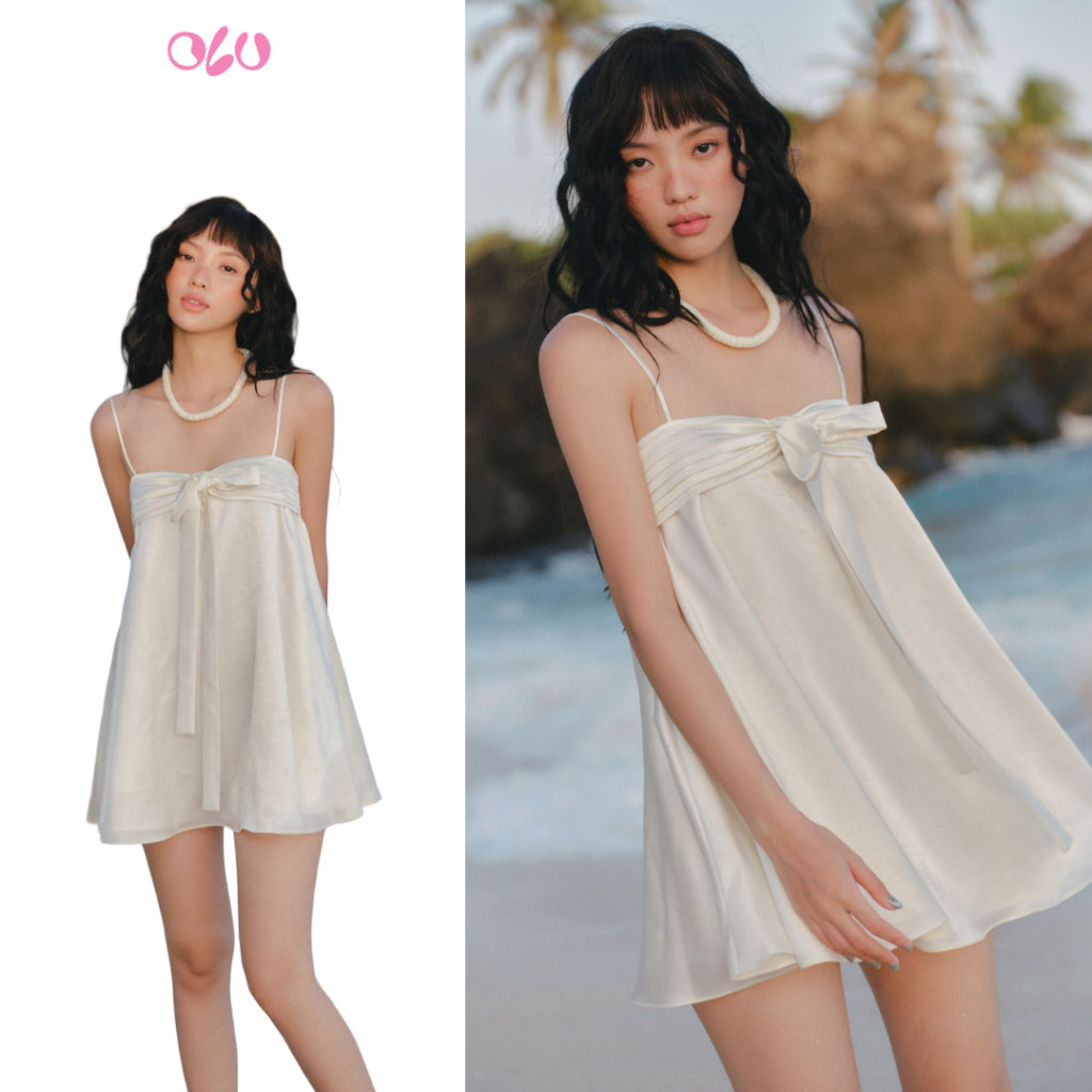 Đầm ngắn OLV lụa màu kem đính nơ nữ tính Cream Satin Bow Strapless Mini Dress đi chơi đi biển