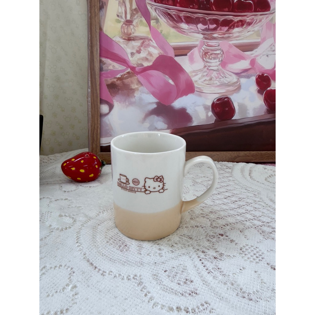 Ly hello kitty sọc vàng
