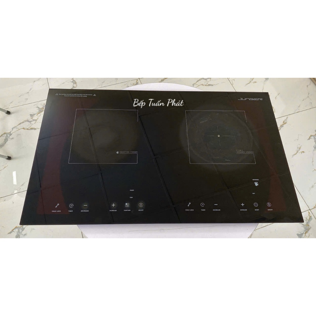 Mặt kính bếp điện từ Junger NKD 20 mới 70%
