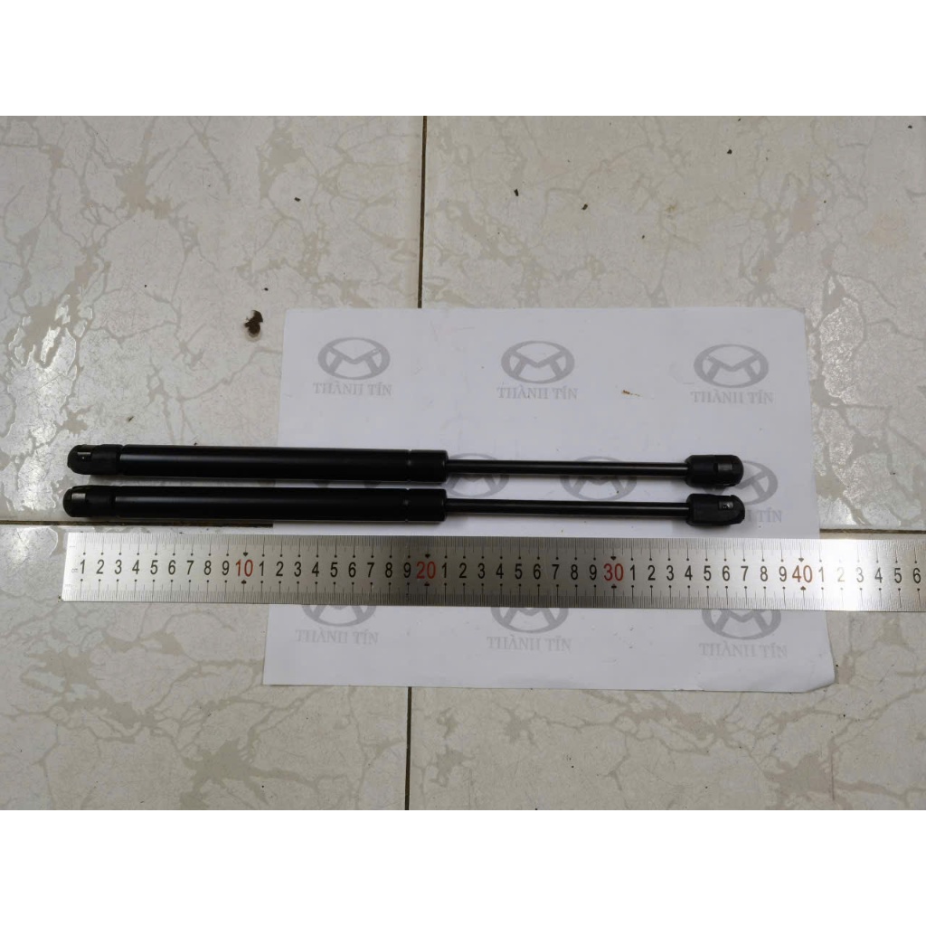 Ty chống nắp capo BMW X1 E84 2009-15